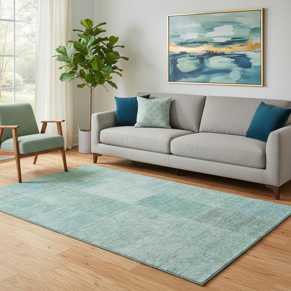 HomeRoots 5' X 8' Teal and Ivory Patchwork Area Rug - Washable, UV-Protected, Durable for High-Traffic Spaces 655236