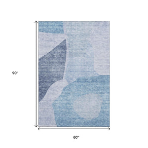 HomeRoots 5' X 8' Denim Blue & Ivory Abstract Area Rug - Stylish, Washable, UV-Protected, Perfect for Homes! 655260