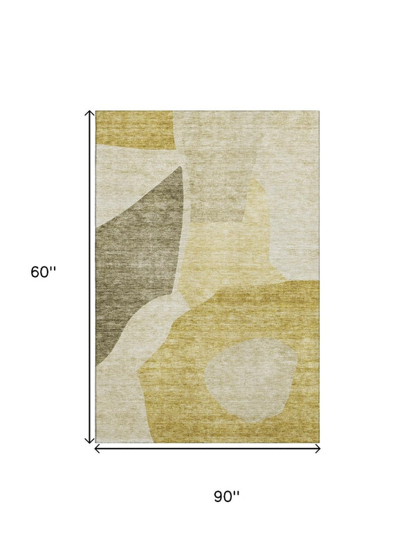 HomeRoots 5' X 8' Gold And Ivory Abstract Washable Area Rug – Stain-Resistant, UV Protected, Modern Style! 655272