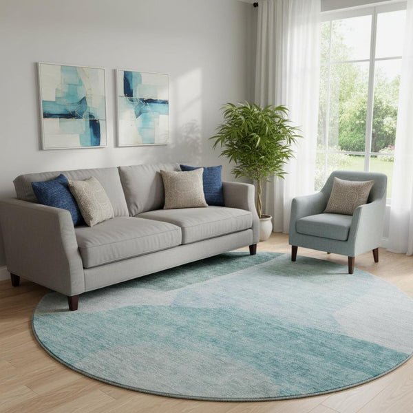HomeRoots 8' Teal And Ivory Abstract Round Rug - Washable, UV-Protected, Stylish & Durable for Active Homes 655291