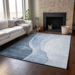 HomeRoots 9' X 12' Blue and Ivory Abstract Area Rug - Washable, UV-Protected & Perfect for High-Traffic Rooms 655311