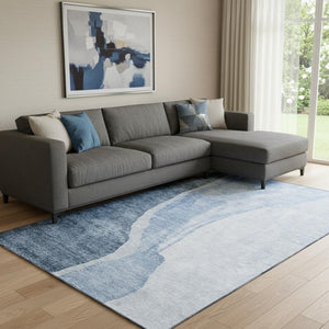 HomeRoots 9' X 12' Blue and Ivory Abstract Area Rug - Washable, UV-Protected & Perfect for High-Traffic Rooms 655311
