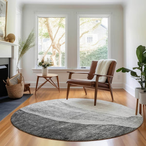 HomeRoots 8' Gray and Ivory Abstract Round Washable Rug with UV Protection for High-Traffic Areas and Style 655321