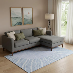 HomeRoots 10' X 14' Denim Blue Abstract Area Rug - Stylish, Washable, UV Resistant & Perfect for High-Traffic Spaces 655385
