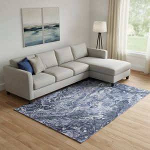HomeRoots 9' X 12' Navy Blue and Ivory Abstract Area Rug - Washable, Stain-Resistant, UV Protected for Durability 655498