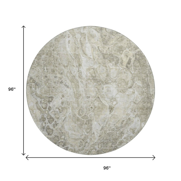 HomeRoots 8' Tan and Ivory Abstract Round Rug - Washable, UV Protected, Durable Design for Active Homes 655508