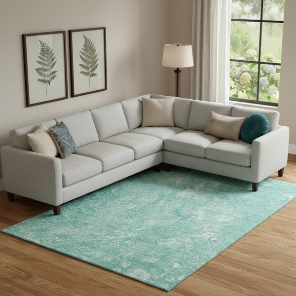 HomeRoots 9' X 12' Teal and Ivory Abstract Area Rug - Stylish, Washable, UV-Protected for High-Traffic Spaces 655516