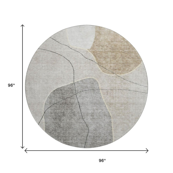 HomeRoots 8' Beige and Brown Abstract Washable Round Rug - Durable, UV-Protected, Ideal for Busy Homes 655582