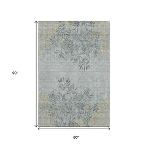 HomeRoots 5' X 8' Gray and Gold Floral Area Rug - Stain Resistant, UV Protected, Washable for Busy Homes! 655634