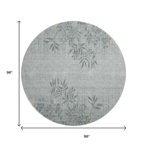HomeRoots 8' Gray and Gold Floral Round Rug - Washable, UV-Protected, Elegant Design for Homes & Patios 655635