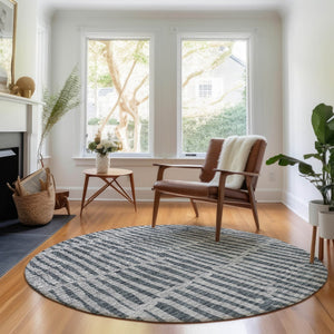 HomeRoots 8' Charcoal and Gray Striped Round Rug - Washable, UV-Protected, Durable for Family Spaces & Patios 655689
