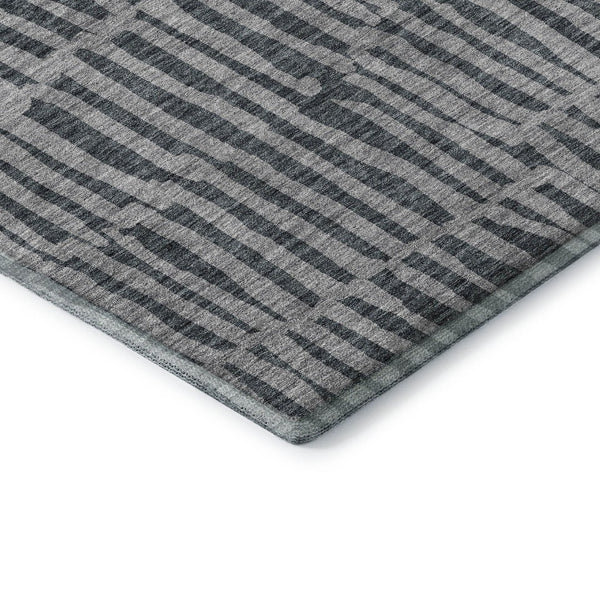 HomeRoots 8' Charcoal and Gray Striped Round Rug - Washable, UV-Protected, Durable for Family Spaces & Patios 655689