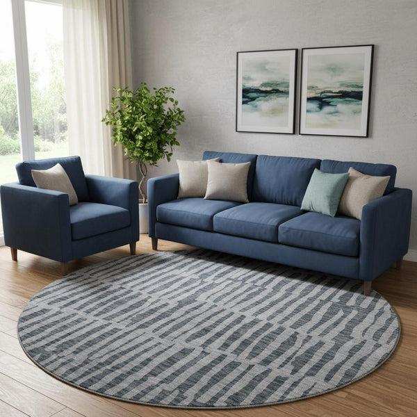 HomeRoots 8' Charcoal and Gray Striped Round Rug - Washable, UV-Protected, Durable for Family Spaces & Patios 655689
