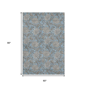 HomeRoots 5' X 8' Washable Floral Area Rug in Blue and Gray - Durable, UV-Protected, Ideal for Everyday Use 655778