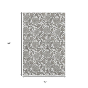 HomeRoots 5' X 8' Ivory and Gray Floral Area Rug - Machine Washable, UV Protected, Durable for High Traffic Areas 655796