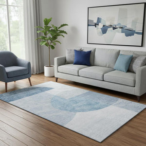 HomeRoots 5' X 8' Geometric Blue and Ivory Washable Area Rug with UV Protection for Stylish Spaces 655820