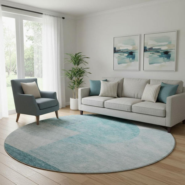 HomeRoots 8' Teal and Ivory Geometric Round Rug - Washable, UV-Protected, Modern Home Décor for Any Space 655863