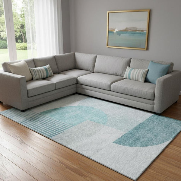HomeRoots 10' X 14' Teal and Ivory Geometric Area Rug – Durable, Washable, UV-Protected for Busy Homes 655866