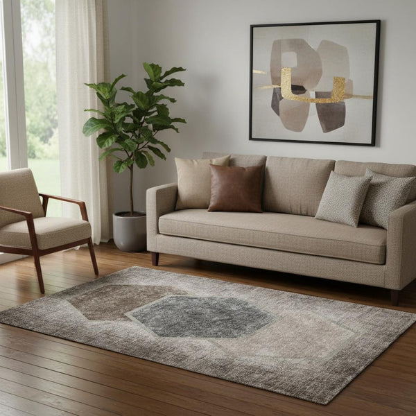 HomeRoots 5' X 8' Geometric Washable Area Rug in Brown Taupe & Charcoal - UV Protected, Durable & Stylish decor 655874