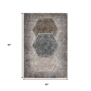 HomeRoots 5' X 8' Geometric Washable Area Rug in Brown Taupe & Charcoal - UV Protected, Durable & Stylish decor 655874