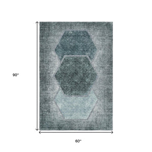 HomeRoots 5' Teal and Ivory Geometric Area Rug - Washable, UV-Protected, Durable for Homes with Kids & Pets 655892