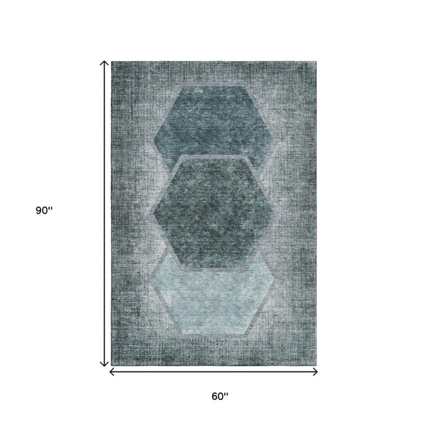 HomeRoots 5' Teal and Ivory Geometric Area Rug - Washable, UV-Protected, Durable for Homes with Kids & Pets 655892