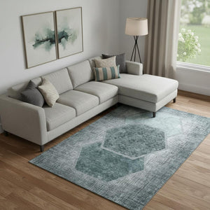 HomeRoots 9' X 12' Teal and Ivory Washable Geometric Area Rug with UV Protection for High-Traffic Spaces 655895
