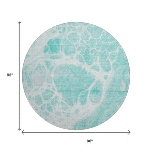 HomeRoots 8' Aqua and Ivory Abstract Round Rug - Washable, Stain Resistant, UV Protected for Indoor/Outdoor Use 656019