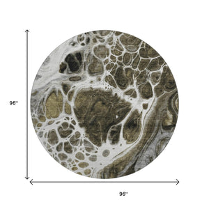 HomeRoots 8' Chocolate and Ivory Abstract Round Area Rug - Washable, UV-Protected, Durable for High Traffic Areas 656025