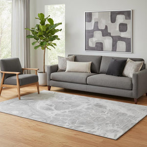 HomeRoots 5' X 8' Gray and Ivory Abstract Area Rug - Washable, UV Protected, Durable for Pets & Kids' Spaces 656036