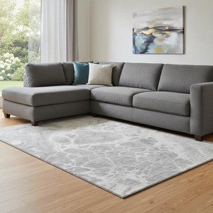 HomeRoots 10' Gray and Ivory Abstract Washable Area Rug with UV Protection for Stylish, Durable Spaces 656040