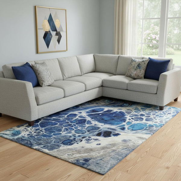 HomeRoots 10' X 14' Navy Blue Abstract Area Rug - Stylish, Washable & UV Protected for High-Traffic Spaces 656052