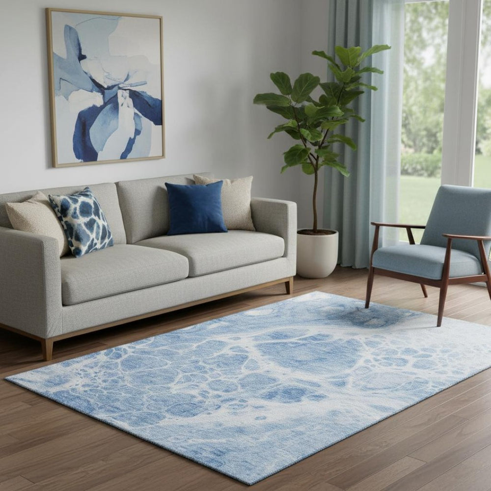 HomeRoots 5' X 8' Sky Blue And Ivory Abstract Area Rug – Washable, UV Protected, and Perfect for Any Room 656060