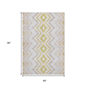 HomeRoots 5' X 8' Pearl Gold & Ivory Geometric Area Rug - Washable, Stain Resistant, UV Protected for Longevity 656090