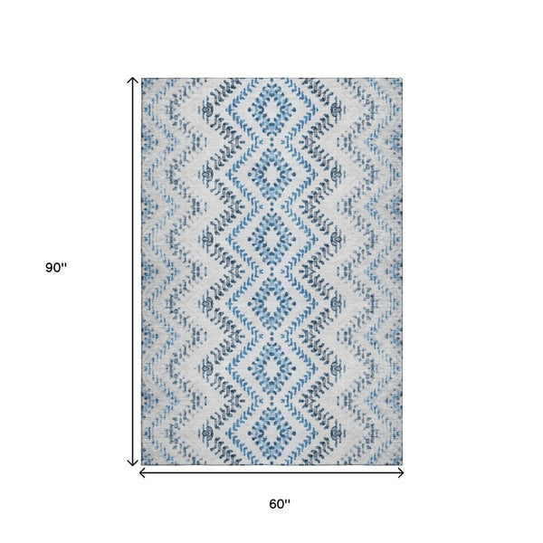 HomeRoots 5' X 8' Blue and Ivory Geometric Area Rug – Washable, Stain Resistant, UV Protection for Modern Spaces 656102