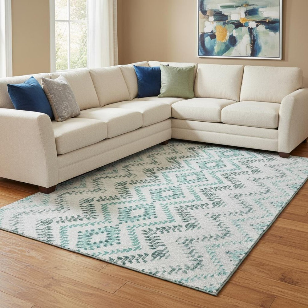 HomeRoots 9' X 12' Teal and Ivory Geometric Area Rug - Washable, UV Protected, Perfect for High-Traffic Spaces 656117