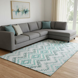 HomeRoots 10' X 14' Teal and Ivory Geometric Area Rug - Washable, UV Protected, Stain Resistant for Homes 656118