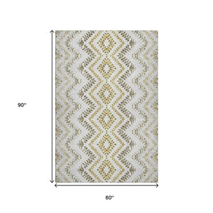 HomeRoots 5' X 8' Taupe Ivory Gold Geometric Area Rug - Washable, UV-Protected, Stylish & Durable for Homes 656120