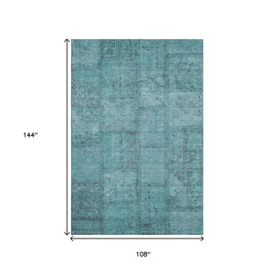 HomeRoots 9' X 12' Stylish Teal and Gray Patchwork Area Rug – Washable, UV Protected, Perfect for Active Spaces! 656177