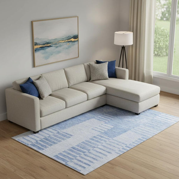 HomeRoots 10' Blue and Ivory Striped Washable Area Rug with UV Protection - Perfect for High-Traffic Spaces! 656202