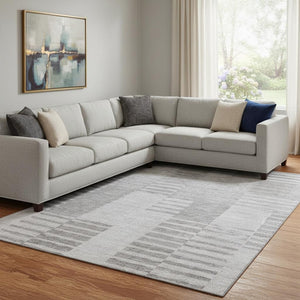 HomeRoots 8' X 10' Silver and Gray Striped Area Rug - Washable, UV Protected, Perfect for High-Traffic Spaces 656230