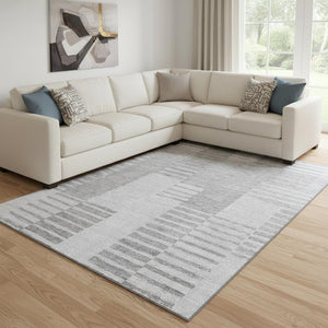 HomeRoots 10' X 14' Stylish Silver and Gray Striped Washable Rug with Stain Resistance and UV Protection 656232