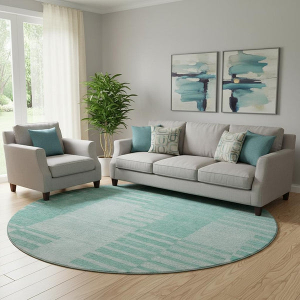 HomeRoots 8' Teal and Ivory Striped Round Rug - Washable, UV Protected, Perfect for High-Traffic Areas! 656235
