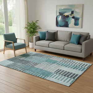 HomeRoots 5' X 8' Coastal Teal Ivory Gray Striped Washable Area Rug - UV Protected, Family-Friendly Design 656270