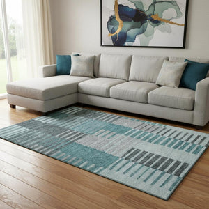 HomeRoots 9' X 12' Striped Teal Ivory Gray Washable Area Rug with UV Protection for Indoor-Outdoor Spaces 656273