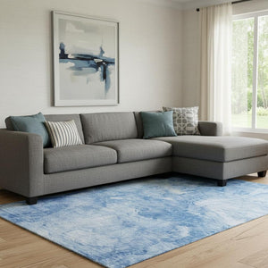 HomeRoots 9' X 12' Stylish Blue and Ivory Abstract Area Rug - Washable, UV Protected, Durable for Homes & Patios 656285