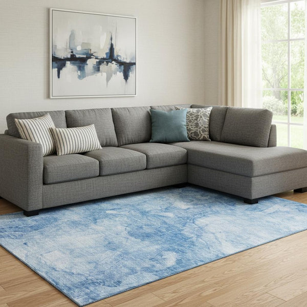 HomeRoots 10' Blue and Ivory Abstract Area Rug - Washable, UV-Protected, Stain-Resistant for Modern Homes 656286