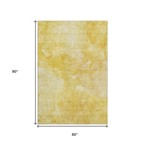 HomeRoots 5' X 8' Gold And Ivory Abstract Washable Area Rug - Stylish, Durable, UV-Protected for Every Room! 656288