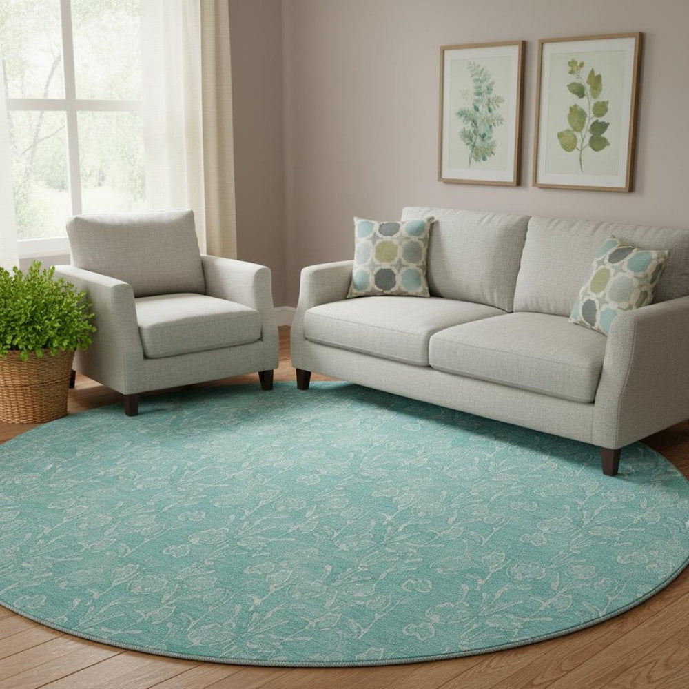HomeRoots 8' Teal and Ivory Floral Washable Round Rug – Durable, UV-Protected Design for Easy Care & Style 656427