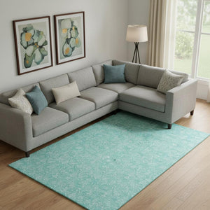 HomeRoots 9' X 12' Teal And Ivory Floral Area Rug - Washable, UV-Protected, Perfect for High-Traffic Spaces! 656429